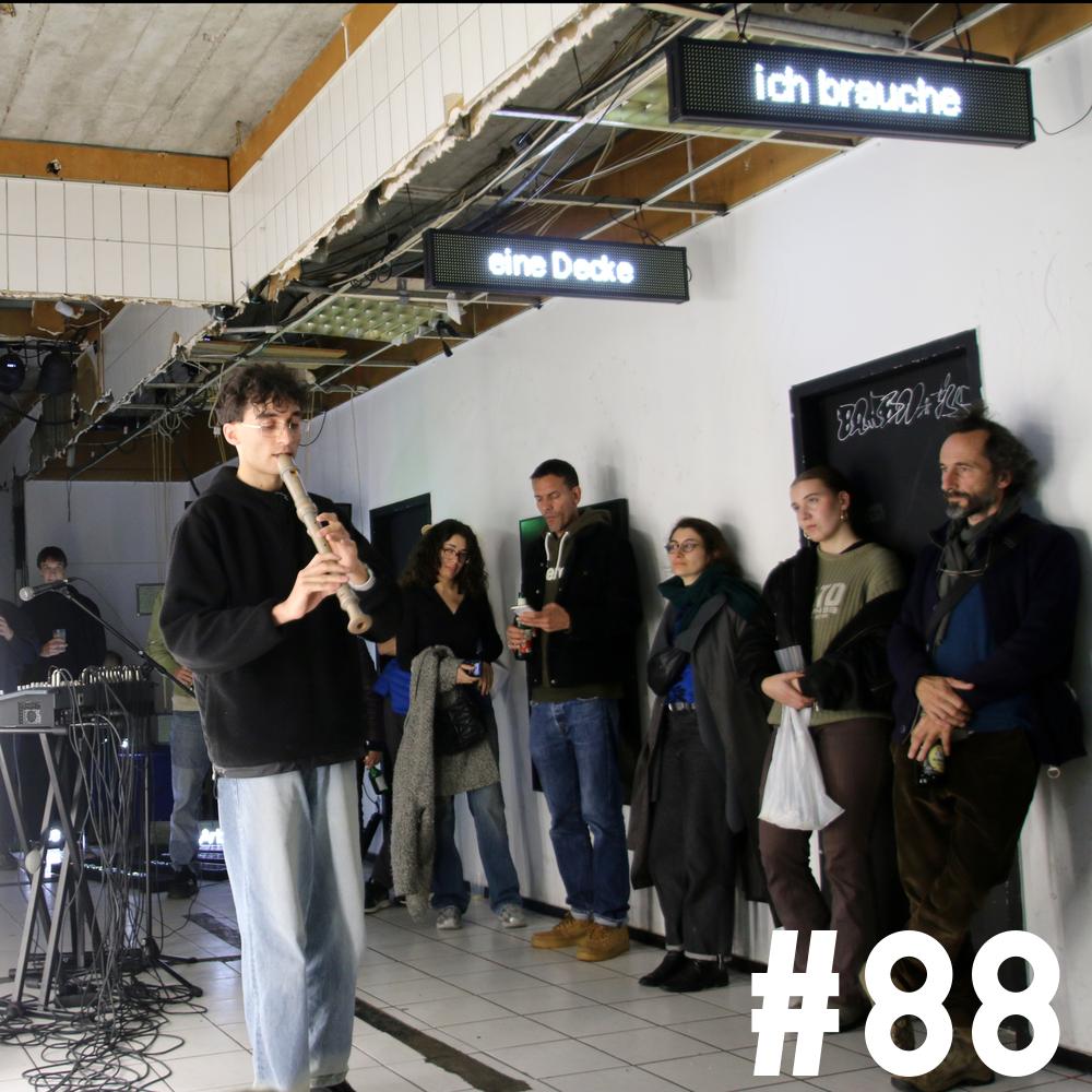 Otto Hashmi performing to a small standing audience